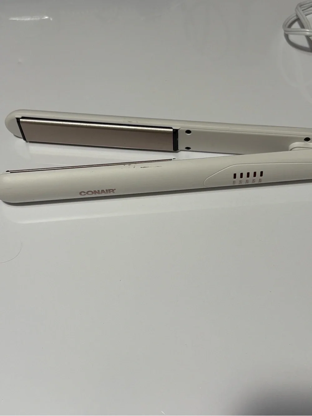 Bundle: 1 Conair White Hair Straightener and round heating brush.